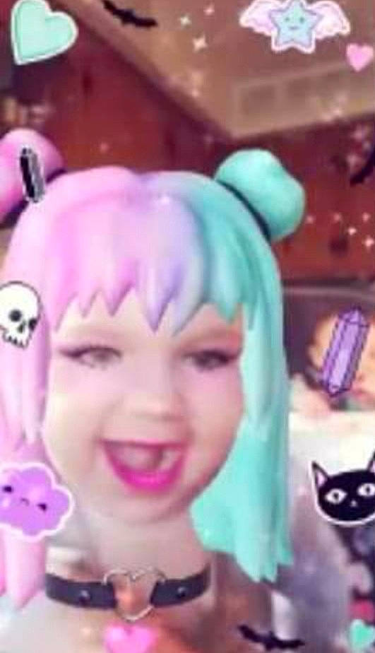 Lillian Aka Lilly is registered to the contest to win money with this photo: animation, cartoon, cheek, cool, ear, eye, eyebrow, face, facial_expression, forehead, hair_coloring, head, headwear, lip, mouth, nose, person, pink, purple, smile