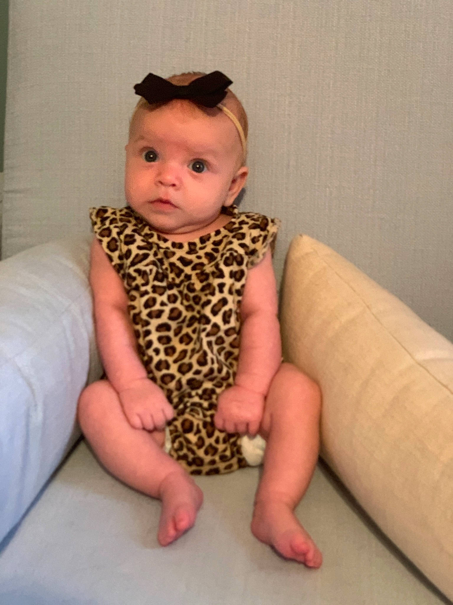 Skylar joined the competition — help win amazing prizes! baby, baby_toddler_clothing, cheek, child, comfort, finger, flooring, foot, human_leg, knee, pattern, person, pink, sitting, skin, sleeve, standing, stomach, thigh, thumb