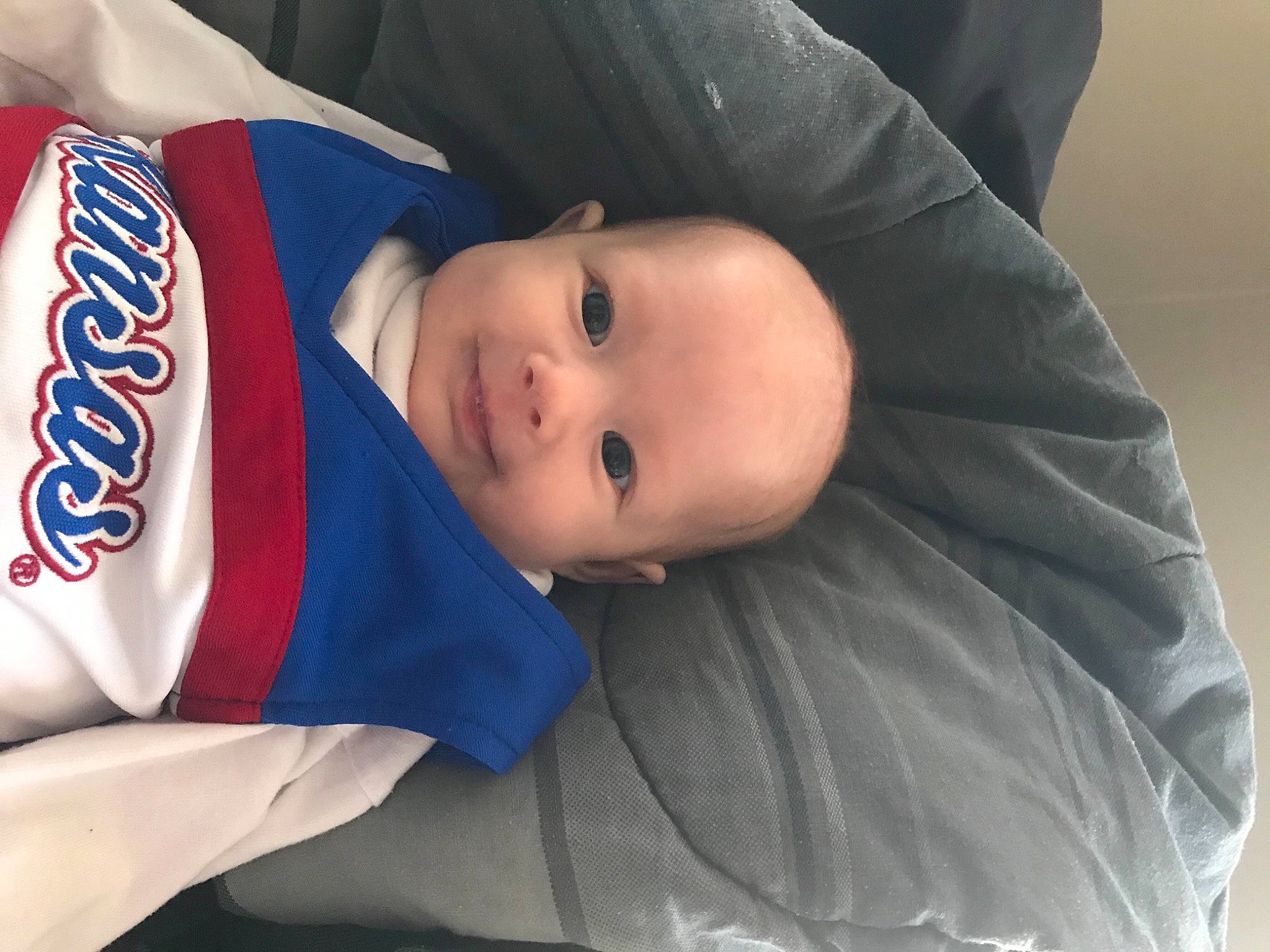 Elana joined the competition — help win amazing prizes! baby, baby_toddler_clothing, baseball_cap, cap, carbonated_soft_drinks, carmine, child, comfort, electric_blue, fashion_accessory, flag_of_the_united_states, fun, hat, lip, logo, person, sleeve, smile, toddler