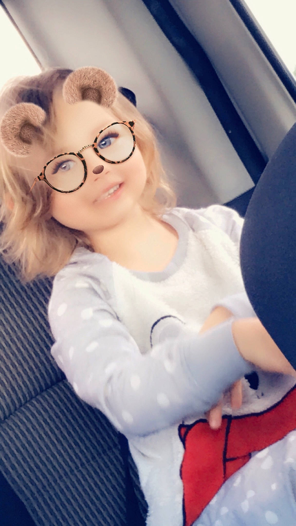 Renesmee is registered to the contest to win money with this photo: auto_part, automotive_design, brown_hair, car_seat, car_seat_cover, electric_blue, eyelash, eyewear, flash_photography, gesture, glasses, goggles, happy, long_hair, person, personal_luxury_car, personal_protective_equipment, steering_wheel, street_fashion, vehicle_door