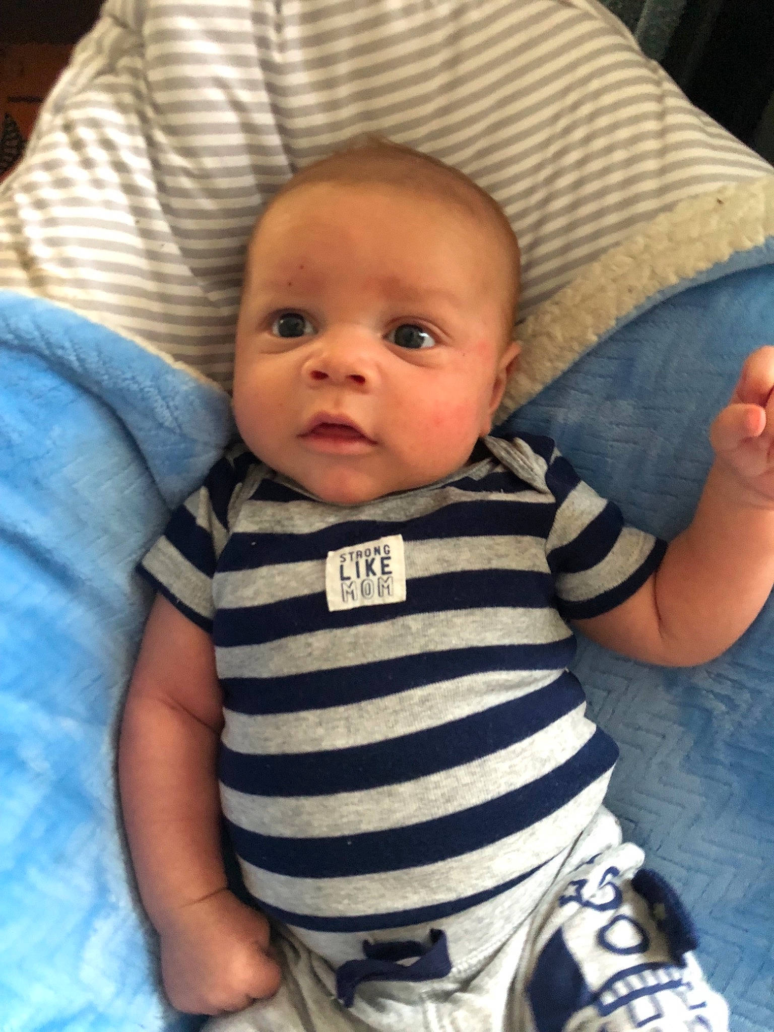 Souleymane is registered to the contest to win money with this photo: baby, baby_products, baby_toddler_clothing, cheek, child, cool, eye, face, head, nose, person, product, sitting, skin, smile, t_shirt, toddler