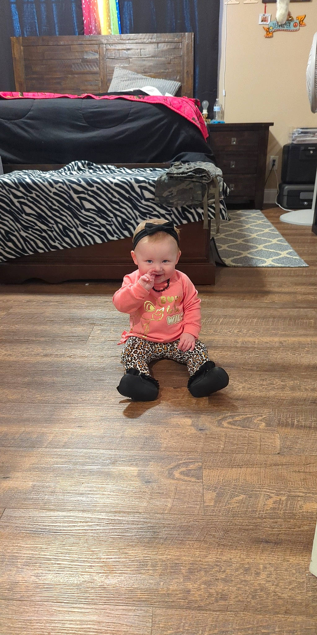 Lennox joined the competition — help win amazing prizes! baby, baby_toddler_clothing, black, cabinetry, child, comfort, drawer, floor, flooring, hardwood, head, laminate_flooring, living_room, person, sitting, standing, television, toddler, varnish, wood