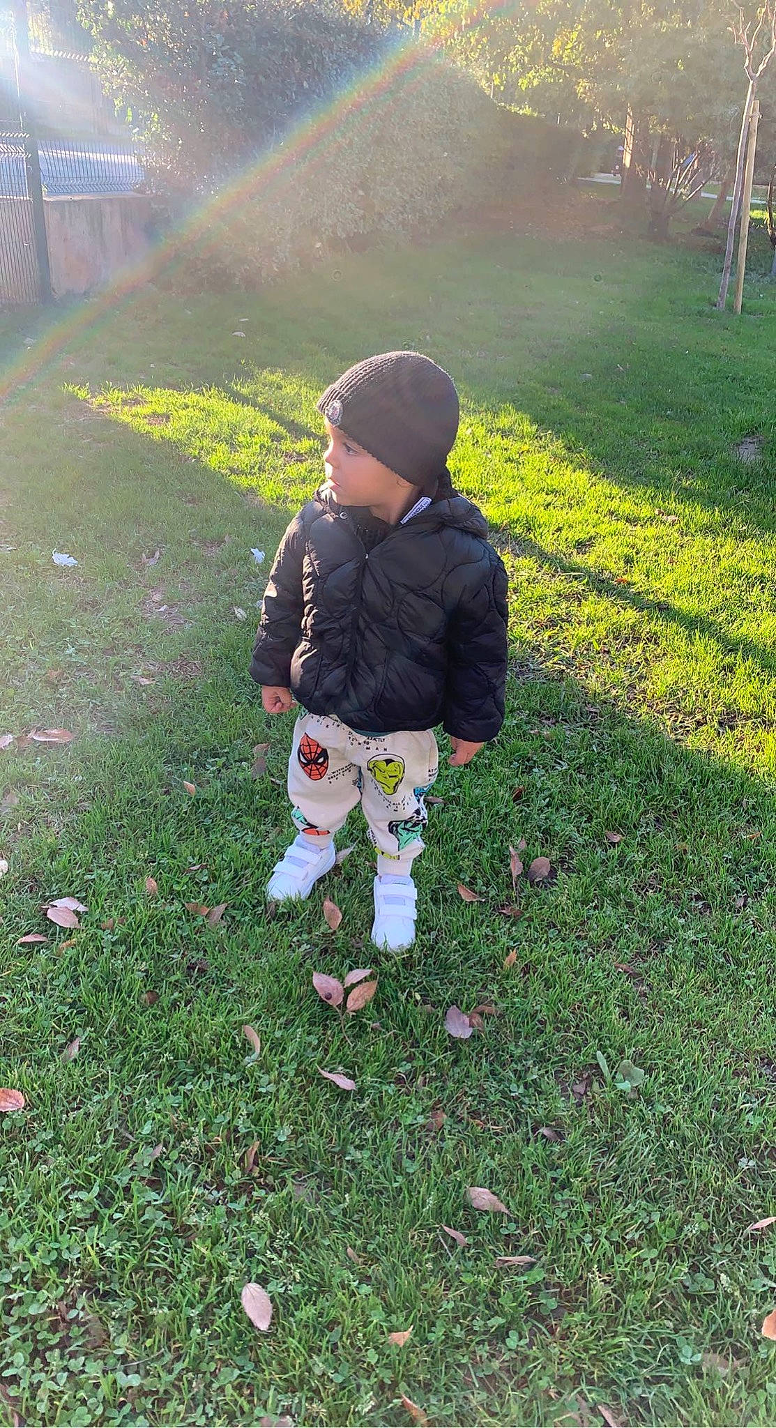 Taylor participe au concours pour gagner de l'argent avec cette photo : baby, baby_toddler_clothing, child, fun, garden, grass, grassland, groundcover, happy, headwear, landscape, lawn, meadow, people_in_nature, person, plant, rainbow, recreation, shadow, soil