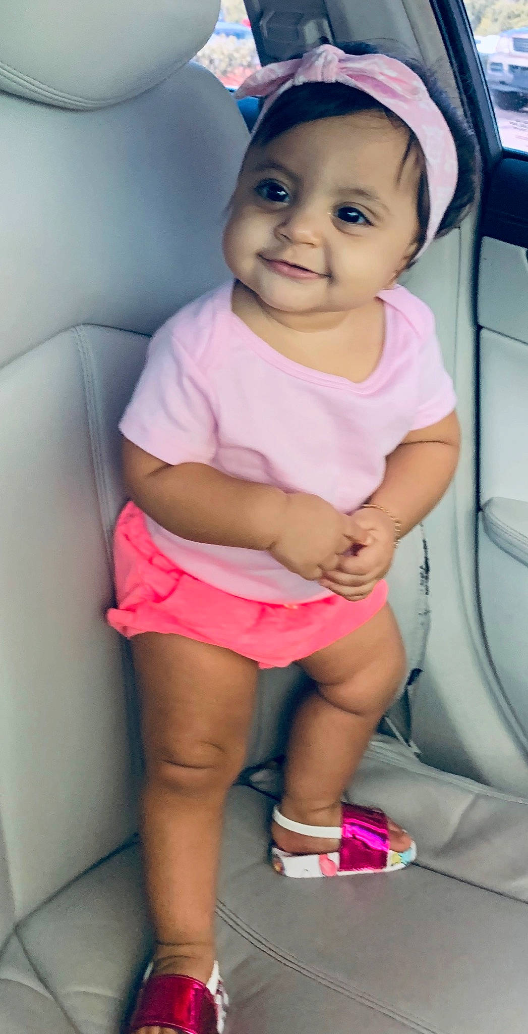 Yahaira is registered to the contest to win money with this photo: baby, cheek, child, daughter, joy, leg, person, pink, potty_training, skin, smile, thigh, toddler