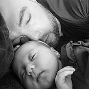 Noéline a rejoint le concours — aidez-le/la à gagner de superbes lots ! baby, sleeping, adult, black_and_white, close_up, face, tender, cozy, resting, peaceful, portrait, family, love, gentle, relaxation, cuddle, soft_light, head, skin, person