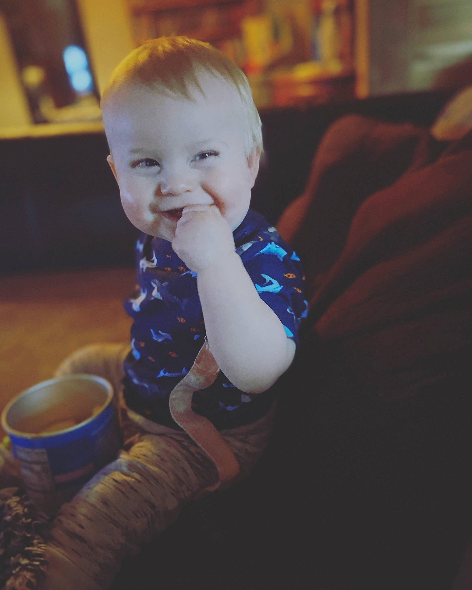 Brodie is registered to the contest to win money with this photo: baby, baby_toddler_clothing, cheek, child, cup, electric_blue, finger, flooring, fun, happy, iris, joy, person, serveware, sitting, sleeve, smile, standing, t_shirt, thumb