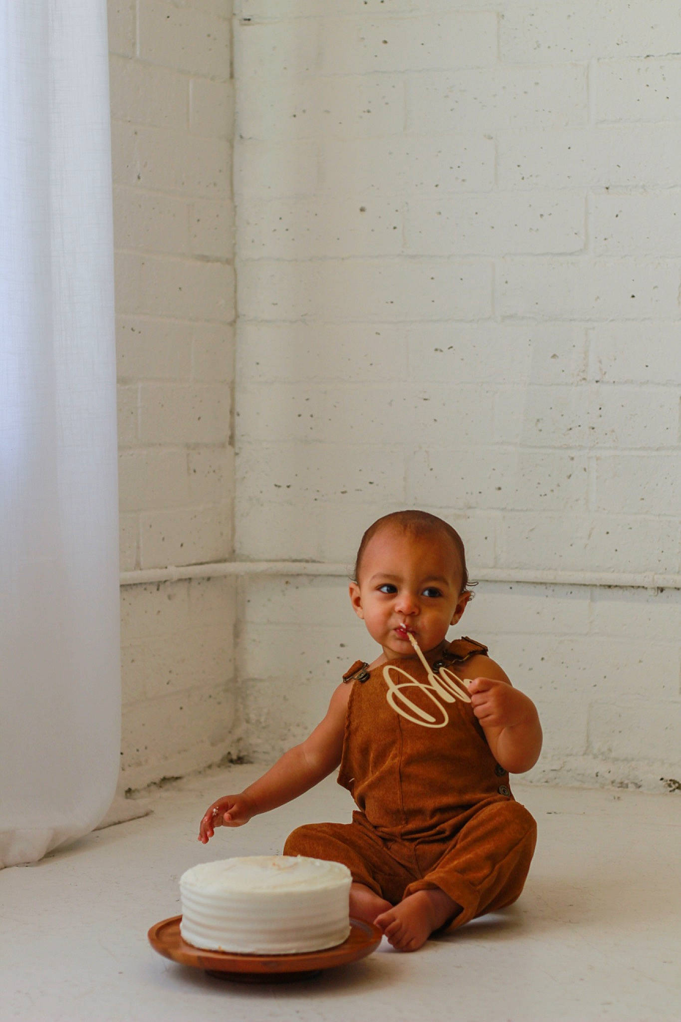 Colson is registered to the contest to win money with this photo: art, baby, baby_toddler_clothing, barefoot, child, elbow, floor, flooring, foot, happy, hardwood, human_leg, knee, person, portrait_photography, room, serveware, sitting, standing, toddler