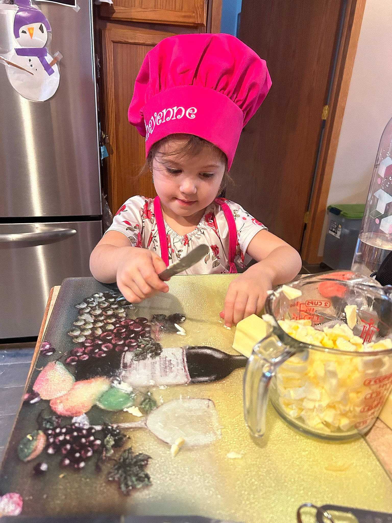 Cheyenne joined the competition — help win amazing prizes! baby, baseball_cap, cap, chair, child, comfort_food, cooking, cuisine, dish, event, food, hat, headwear, holiday, ingredient, person, plate, sweetness, t_shirt, table