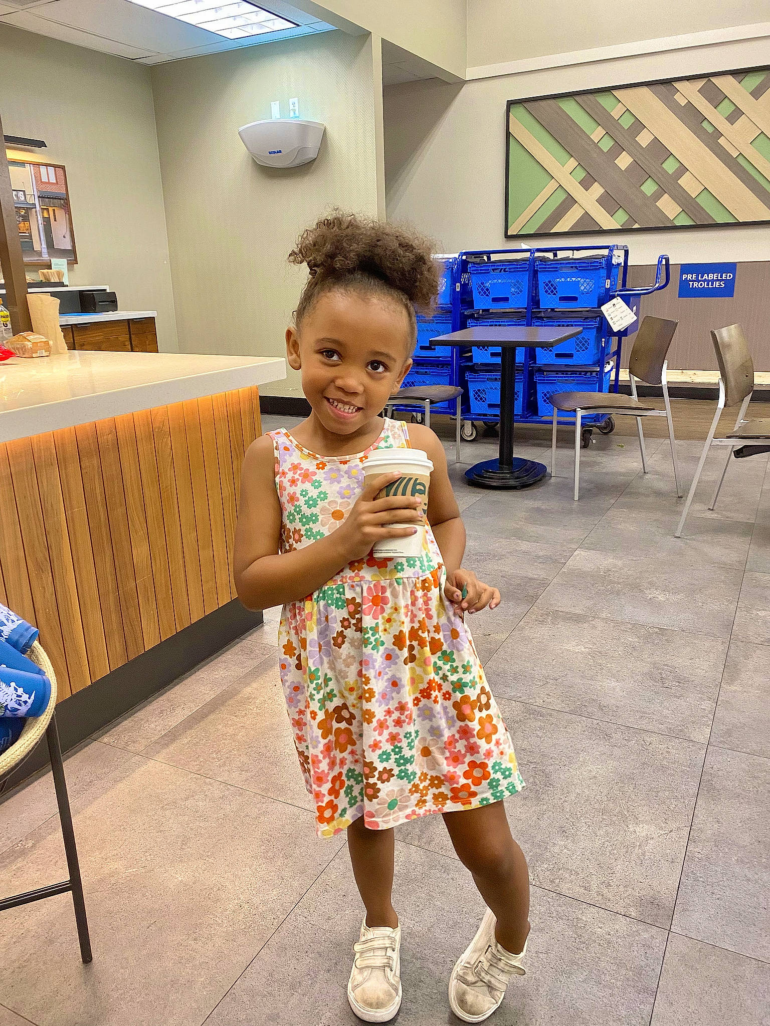 Layah joined the competition — help win amazing prizes! chair, child, event, fashion_design, floor, flooring, fun, happy, joy, leisure, pattern, person, recreation, room, sandal, smile, standing, table, toddler, vacation