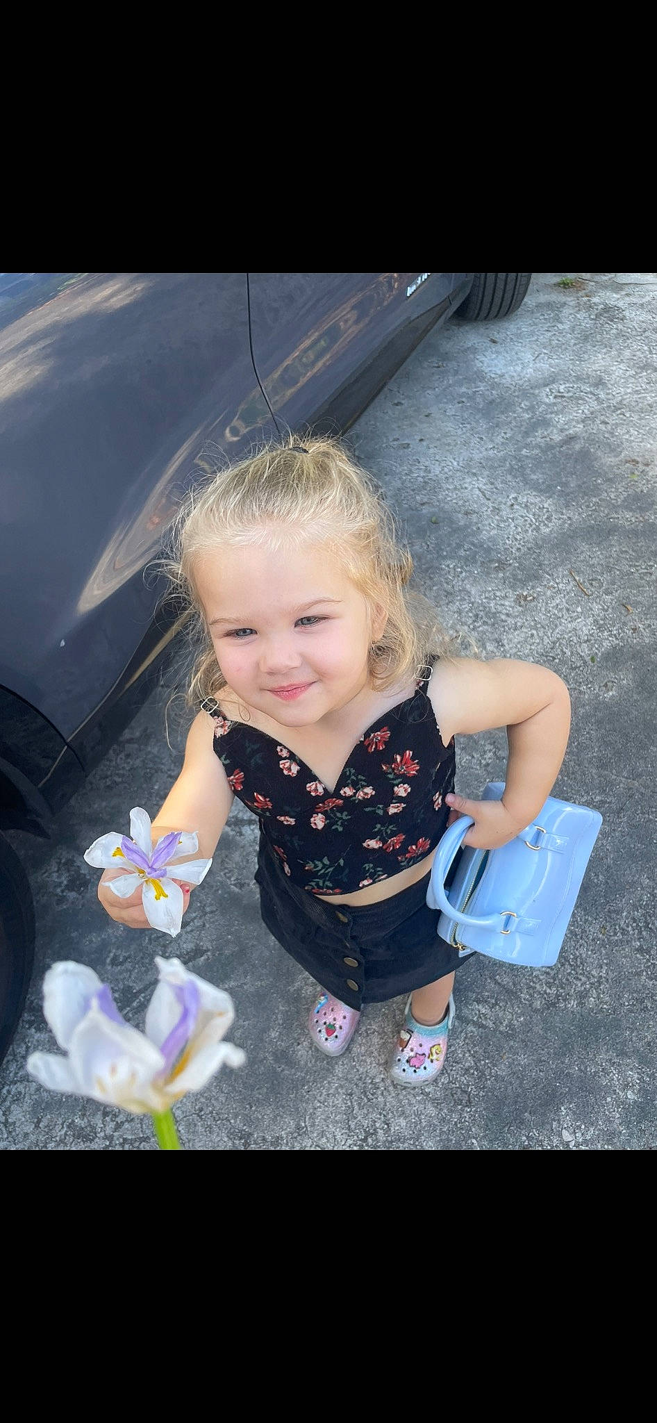 Artemis is registered to the contest to win money with this photo: asphalt, child, cool, dress, electric_blue, eye, finger, flash_photography, fun, grass, hand, happy, head, joy, leisure, person, pink, road_surface, skin, smile