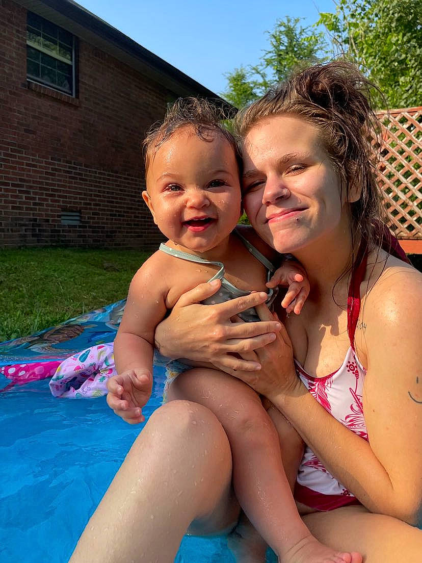 Haisley is registered to the contest to win money with this photo: abdomen, baby, brassiere, chest, event, fun, grass, happy, joy, leg, leisure, person, recreation, skin, sky, smile, summer, sunlight, swimwear, thigh