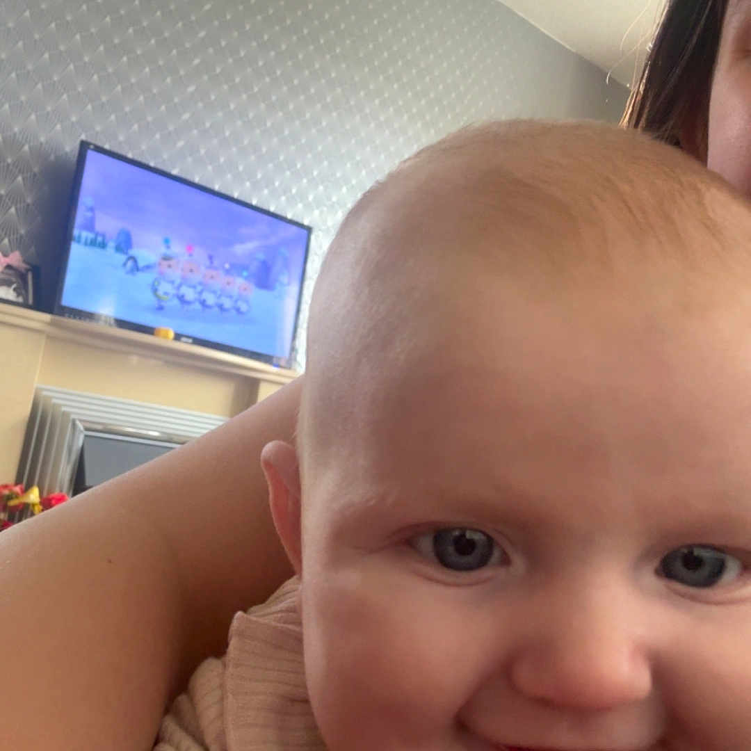 Isabella is registered to the contest to win money with this photo: architecture, baby, bodypart, computer, computerhardware, computerkeyboard, couch, electronics, face, finger, furniture, hand, hardware, head, monitor, person, photography, portrait, screen, tv