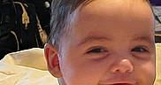 Ramey is registered to the contest to win money with this photo: baby, background, blanket, candid, child, cute, expression, face, hair, happy, head, indoors, person, portrait, shoulders, sitting, skin, smile, soft, young