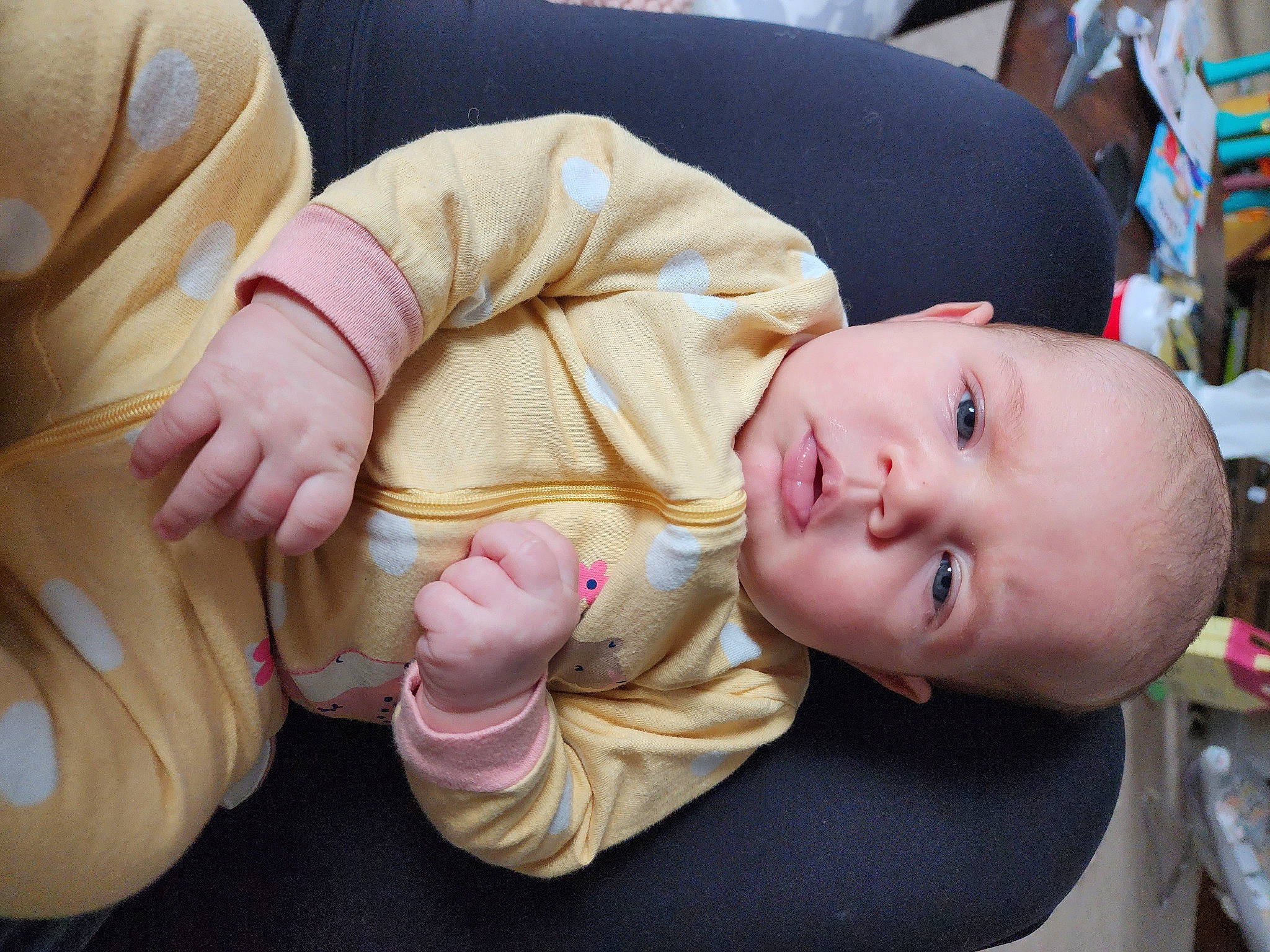 Olivia joined the competition — help win amazing prizes! baby, baby_products, baby_toddler_clothing, barefoot, cheek, child, comfort, finger, flooring, foot, gesture, human_leg, mammal, person, sitting, skin, thigh, thumb, toddler, toe