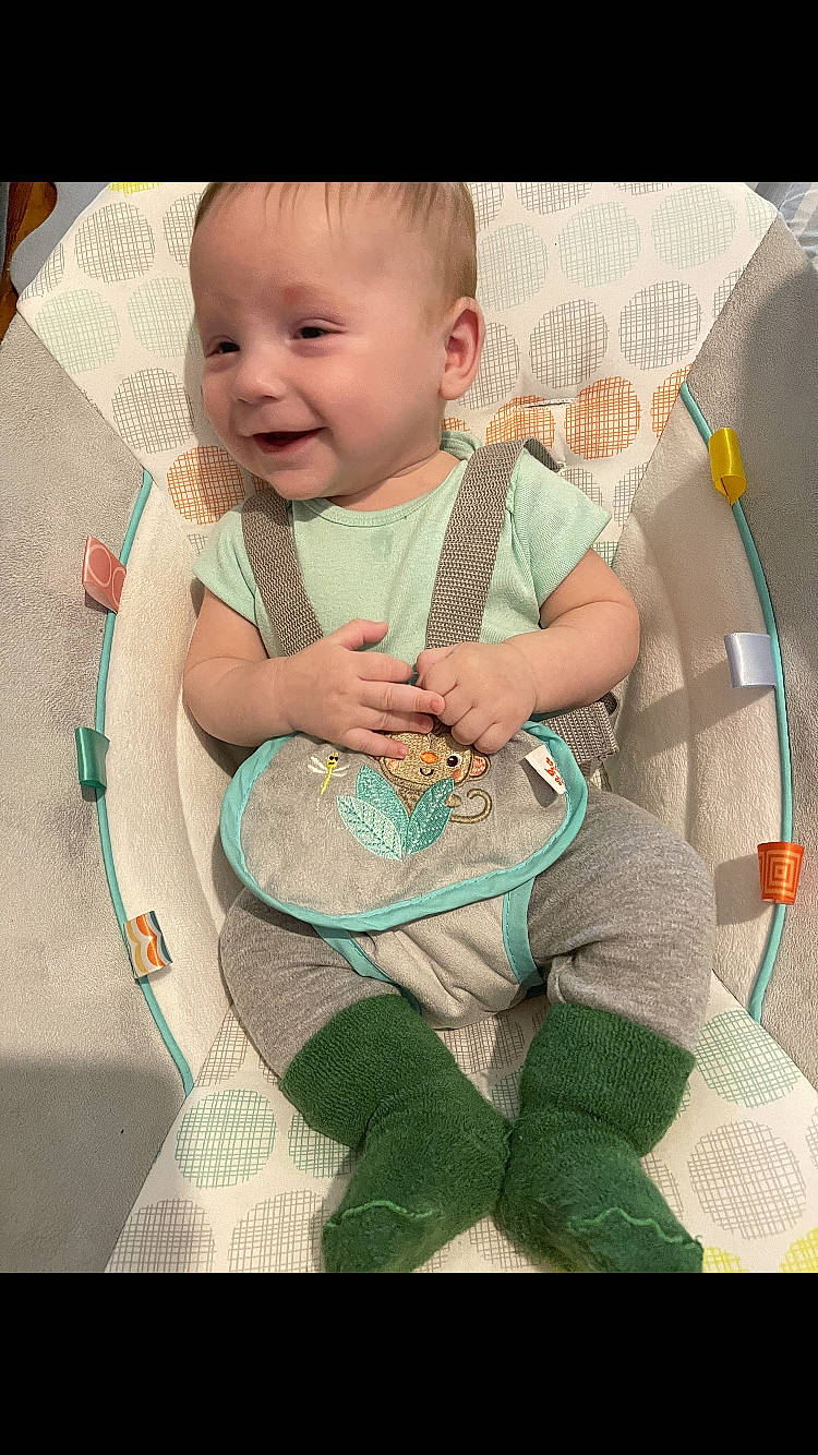 Jason joined the competition — help win amazing prizes! arm, baby, baby_products, baby_toddler_clothing, chair, cheek, child, comfort, happy, iris, linens, pattern, person, sitting, skin, sleeve, smile, t_shirt, textile, thigh