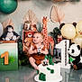 baby, child, birthday, cake, panda, stuffed_animal, giraffe, balloon, decorations, jungle_theme, toy, owl, lion, monkey, zebra, number_one, green, white, celebration, party