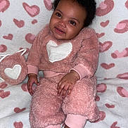 Ameri Tru Bailey is registered to the contest to win money with this photo: baby, blanket, bodypart, clothing, couch, cushion, dress, face, finger, furniture, hand, happy, head, homedecor, indoors, person, photography, portrait, sitting, smile