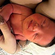 Elsie joined the competition — help win amazing prizes! newborn, baby, infant, hand, adult_hand, tattoo, nail_art, sleeping, skin, closeup, person, human, fingers, wrinkles, soft_light, peaceful, resting, portrait, indoor, family