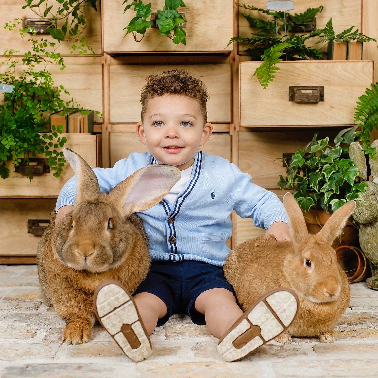 Slayte is registered to the contest to win money with this photo: domestic_rabbit, ear, eye, fawn, fun, fur, grass, happy, hare, joy, leg, leisure, person, plant, rabbit, rabbits_and_hares, shoe, shorts, sitting, skin
