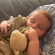 Livio participe au concours pour gagner de l'argent avec cette photo : baby, blanket, casual, child, closeup, comfort, couch, cozy, home, indoor, infant, nap, pacifier, peaceful, pillow, relaxation, rest, sleeping, soft_toy, stuffed_animal