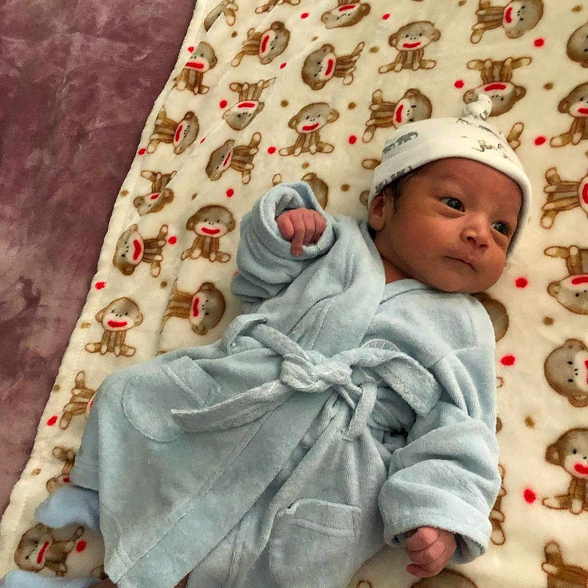 Ritchie is registered to the contest to win money with this photo: baby, child, headwear, linens, person, textile, toddler
