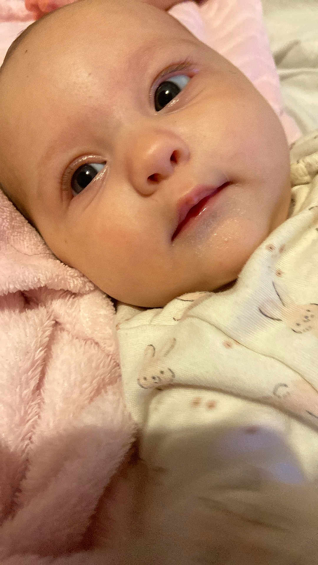 Shelbyrose joined the competition — help win amazing prizes! baby, face, closeup, blanket, soft, infant, onesie, cute, skin, expression, lying_down, newborn, child, sleepwear, indoors, portrait, head, young, pink, comfort