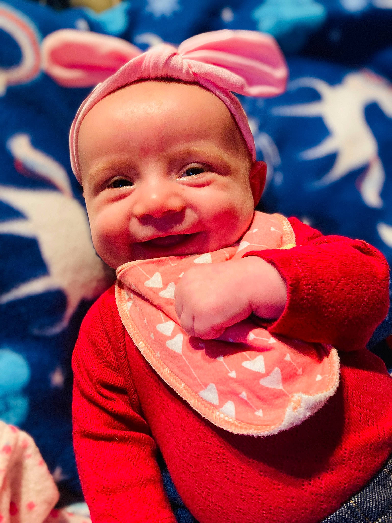 Jessica joined the competition — help win amazing prizes! baby, baby_laughing, baby_toddler_clothing, blue, cap, cheek, child, facial_expression, finger, gesture, happy, human_body, lip, mouth, nose, person, pink, skin, sleeve, smile