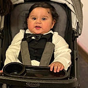 Shiven joined the competition — help win amazing prizes! baby, child, tuxedo, bow_tie, stroller, graco, black_hair, white_shirt, formal_wear, infant, cute, portrait, seated, hand, indoor, face, clothing, person, baby_boy, smile