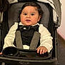baby, child, tuxedo, bow_tie, stroller, graco, black_hair, white_shirt, formal_wear, infant, cute, portrait, seated, hand, indoor, face, clothing, person, baby_boy, smile