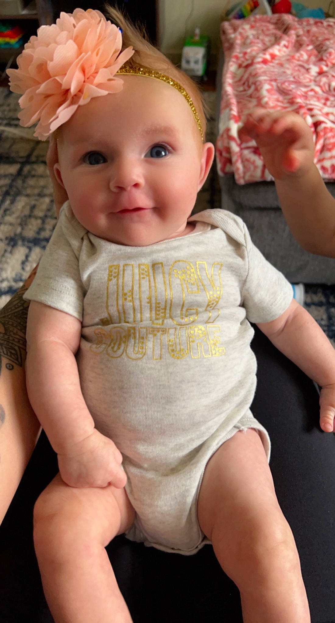 Nora joined the competition — help win amazing prizes! baby, baby_toddler_clothing, cap, cheek, chin, dress, eye, face, facial_expression, hairstyle, happy, head, human_body, iris, joy, lip, organ, person, skin, sleeve