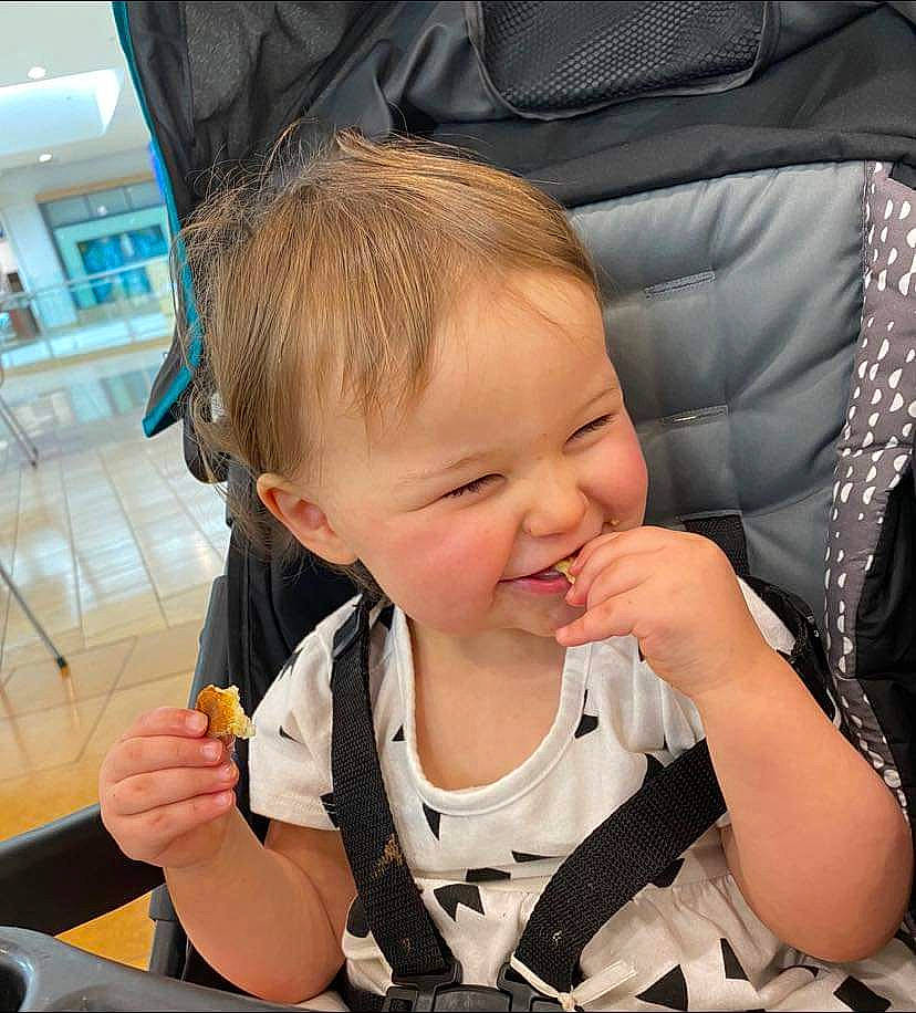 Leah joined the competition — help win amazing prizes! chair, cheek, child, ear, eyelash, finger, fun, gesture, hairstyle, hand, happy, mouth, nail, nose, person, photograph, skin, sleeve, smile, thumb