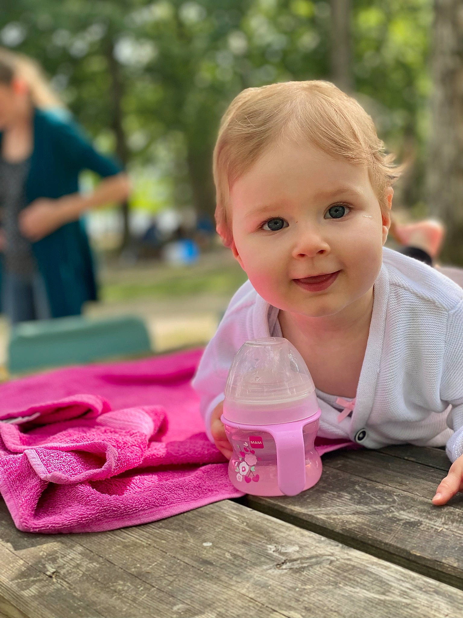 Carly participe au concours pour gagner de l'argent avec cette photo : baby, baby_playing_with_toys, baby_toddler_clothing, child, event, fun, grass, happy, joy, leisure, magenta, people_in_nature, person, pink, recreation, skin, smile, table, toddler, toy