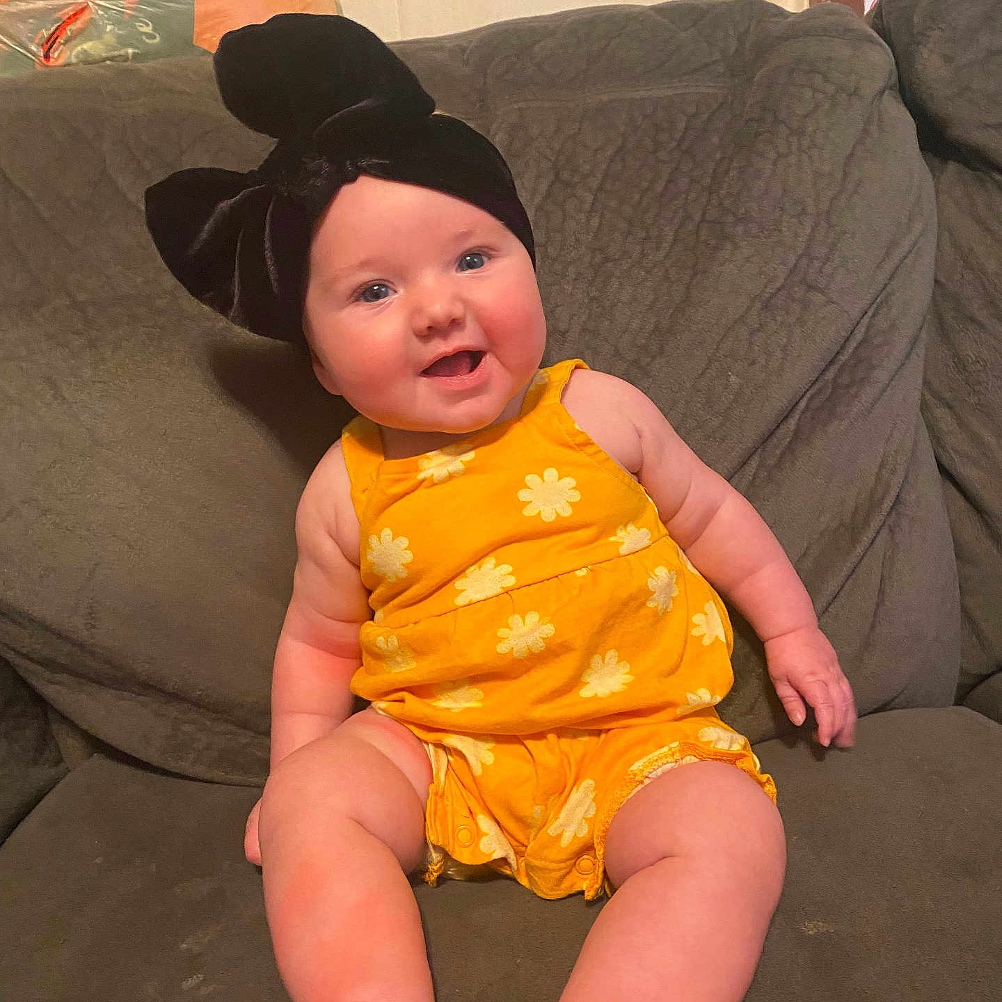 Oaklynn joined the competition — help win amazing prizes! architecture, baby, building, clothing, costume, couch, cowboyhat, cushion, dress, face, furniture, happy, hat, head, homedecor, person, photography, portrait, shorts, sitting