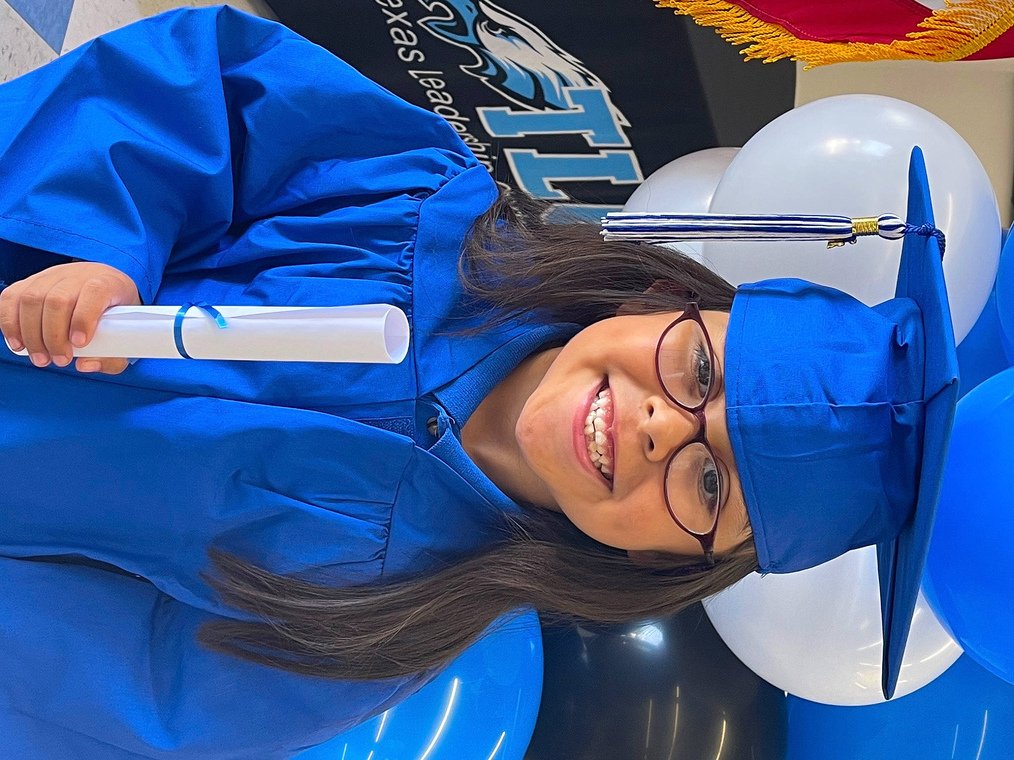 Isabell is registered to the contest to win money with this photo: automotive_design, baseball_cap, blue, electric_blue, fan, fashion_accessory, fictional_character, fun, gesture, happy, hat, headgear, headwear, joy, leisure, mouth, person, personal_protective_equipment, smile, sports_gear