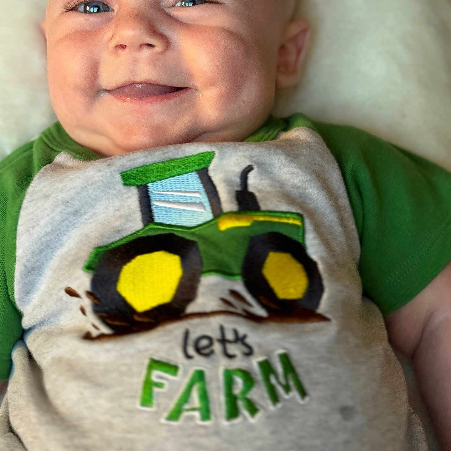 Luke is registered to the contest to win money with this photo: animal, applique, baby, bird, clothing, cushion, electronics, face, happy, head, homedecor, laughing, person, phone, photography, portrait, selfie, shirt, smile, t_shirt