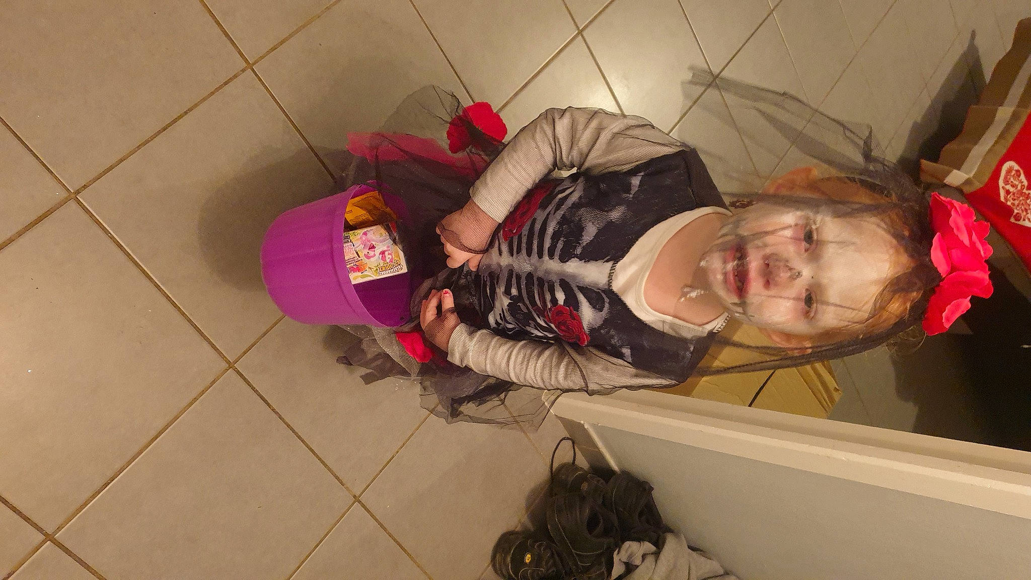 Maëlya participe au concours pour gagner de l'argent avec cette photo : baby, backpack, bag, baggage, boot, child, comfort, costume, floor, flooring, fun, hardwood, knee, luggage_and_bags, magenta, person, room, smile, thigh, toddler