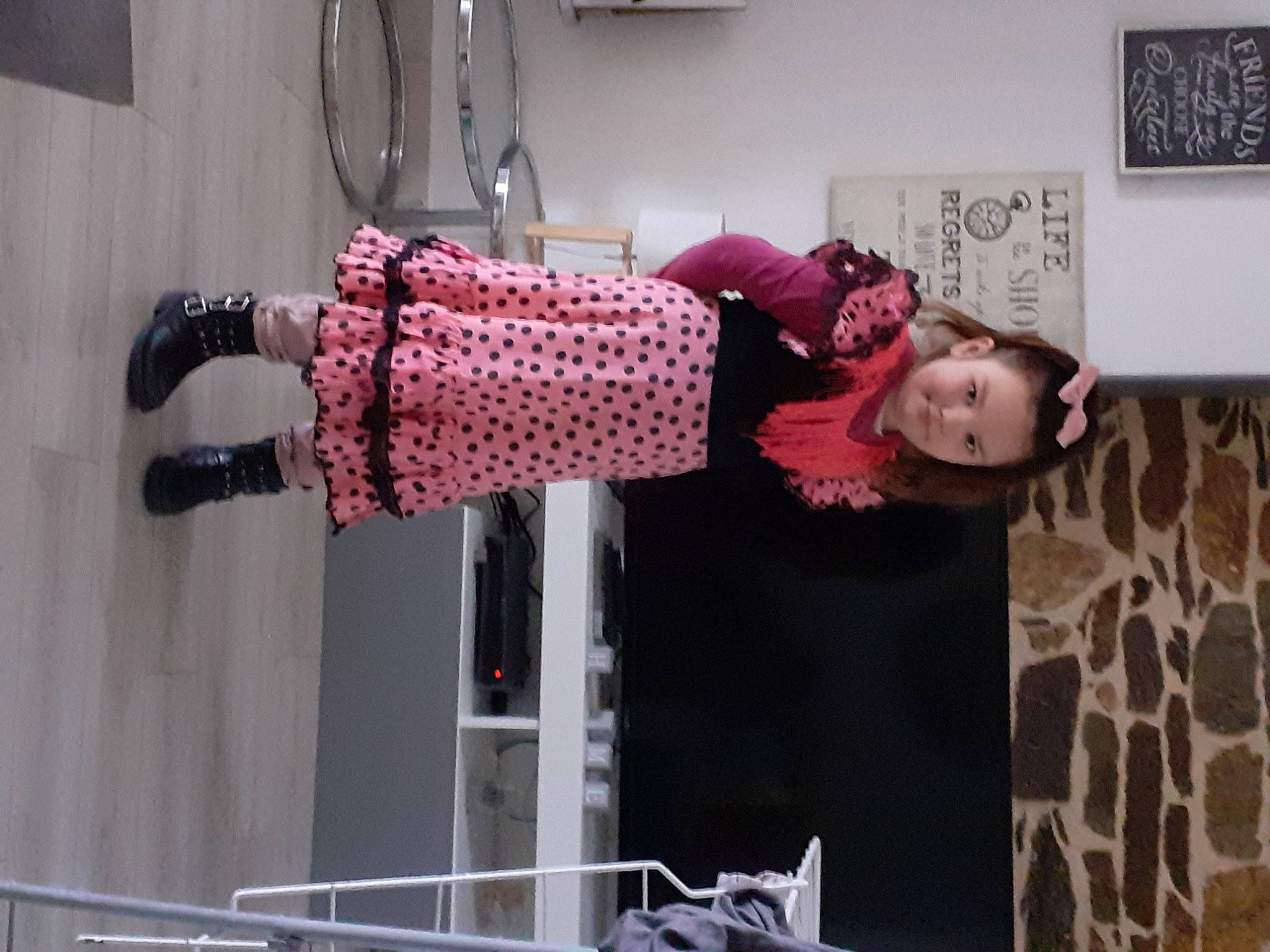 Camillia participe au concours pour gagner de l'argent avec cette photo : child, costume, event, fashion_design, flooring, fun, joint, knee, magenta, pattern, person, picture_frame, pink, purple, room, smile, street_fashion, toddler, visual_arts, waist