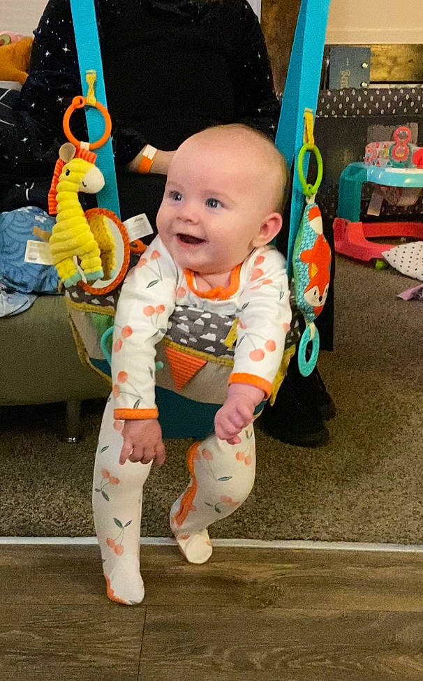 Kora joined the competition — help win amazing prizes! baby, baby_products, baby_toddler_clothing, child, costume, event, flooring, fun, happy, joy, leisure, orange, person, play, room, sitting, sleeve, smile, toddler, toy