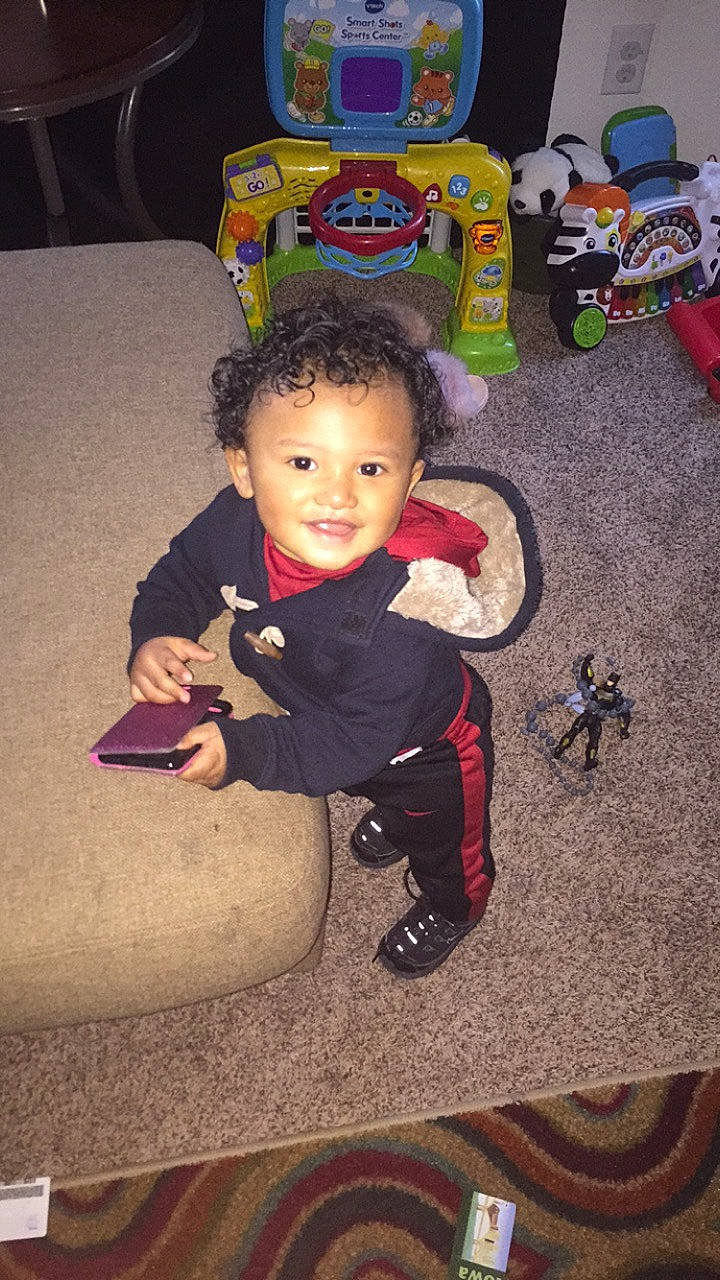 Amarion is registered to the contest to win money with this photo: child, joy, person, play, toddler, toy