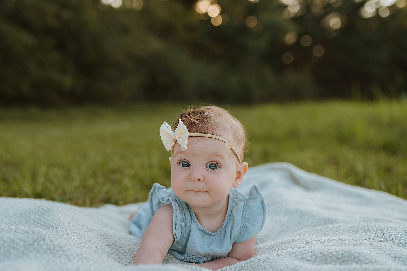 Sunshine is registered to the contest to win money with this photo: baby, baby_toddler_clothing, bonnet, child, costume_accessory, crown, ear, embellishment, hair_accessory, headband, headgear, headpiece, headwear, people_in_nature, person, portrait_photography, skin, spring, summer, textile