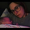 Paisley joined the competition — help win amazing prizes! baby, infant, adult, parent, cuddling, sleeping, portrait, bedroom, blanket, pillow, glasses, eyewear, face, person, indoor, dim_lighting, cozy, family, selfie, text_overlay
