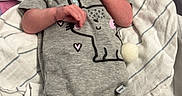Paisley is registered to the contest to win money with this photo: baby, birth, blanket, cartoon_clothing, child, face, feet, hands, hospital, hospital_bed, indoor, infant, lying_down, medical_equipment, monitoring_wires, newborn, nursery, onesie, pacifier, portrait