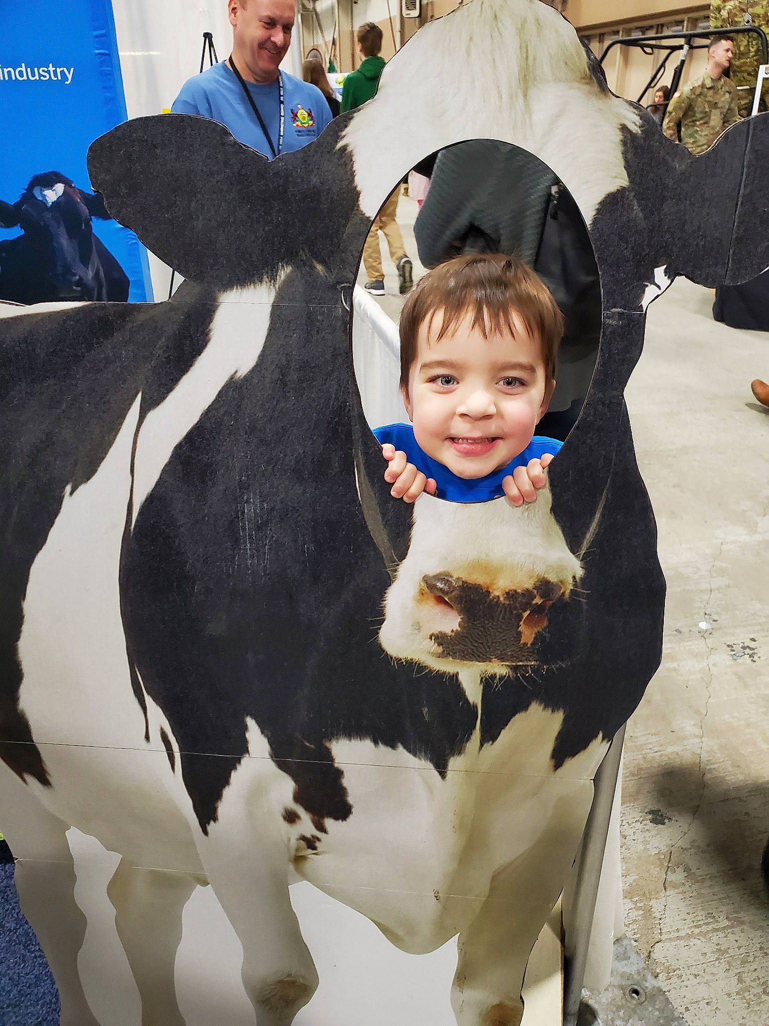 Jack is registered to the contest to win money with this photo: bovine, child, cow_goat_family, dairy, dairy_cow, family, fawn, fun, fur, happy, joy, livestock, male, outerwear, people, person, photography, plant, toddler, tourism