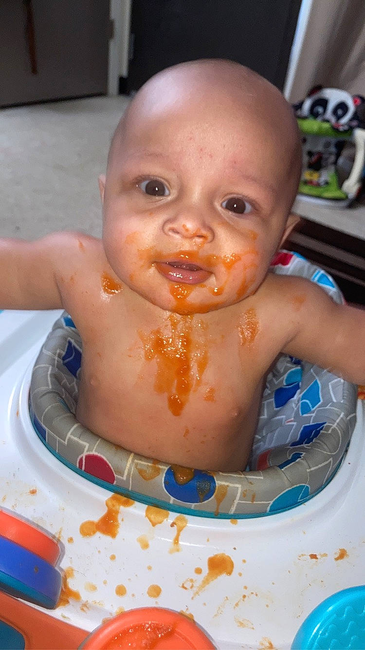 Keion joined the competition — help win amazing prizes! baby, baby_bathing, baby_food, baby_products, bathing, bib, cheek, chest, child, dishware, eyelash, fun, icing, iris, lip, mouth, nose, person, plastic, toddler