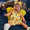 Emilia Rose joined the competition — help win amazing prizes! baby, bed, blanket, child, clothing, cute, footwear, happy, headband, indoor, infant, joyful, person, pillow, portrait, room, sitting, smiling, winnie_the_pooh, yellow_outfit