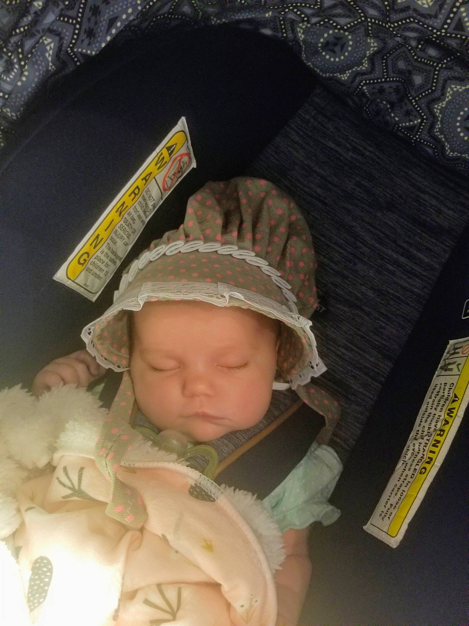 Hera is registered to the contest to win money with this photo: baby, bonnet, cap, child, headgear, person, sleep, toddler