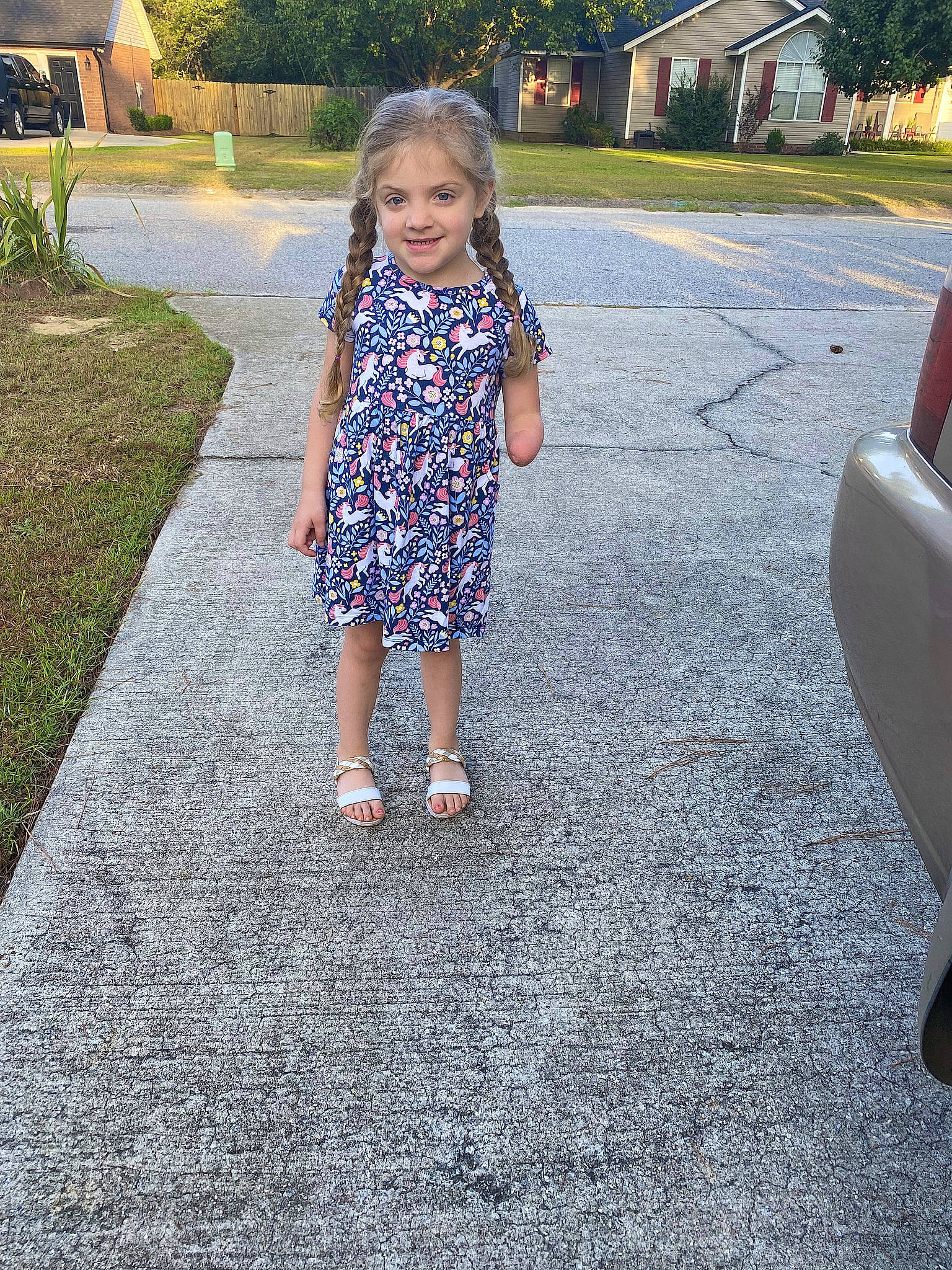 Shelby joined the competition — help win amazing prizes! asphalt, child, dress, driveway, fun, grass, human_leg, joy, lawn, leisure, people_in_nature, person, plant, recreation, road, road_surface, sidewalk, standing, tints_and_shades, toddler