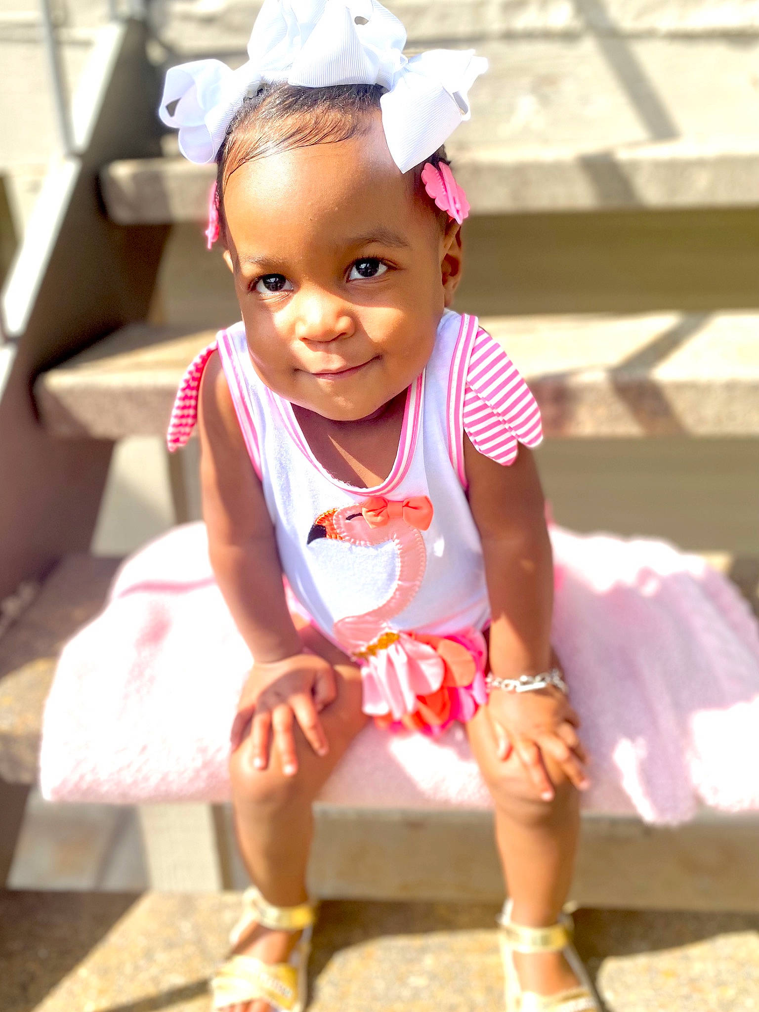 Delilah joined the competition — help win amazing prizes! baby, baby_toddler_clothing, cap, child, chin, eye, happy, head, headgear, leisure, lip, magenta, neck, person, pink, recreation, sandal, skin, smile, toddler