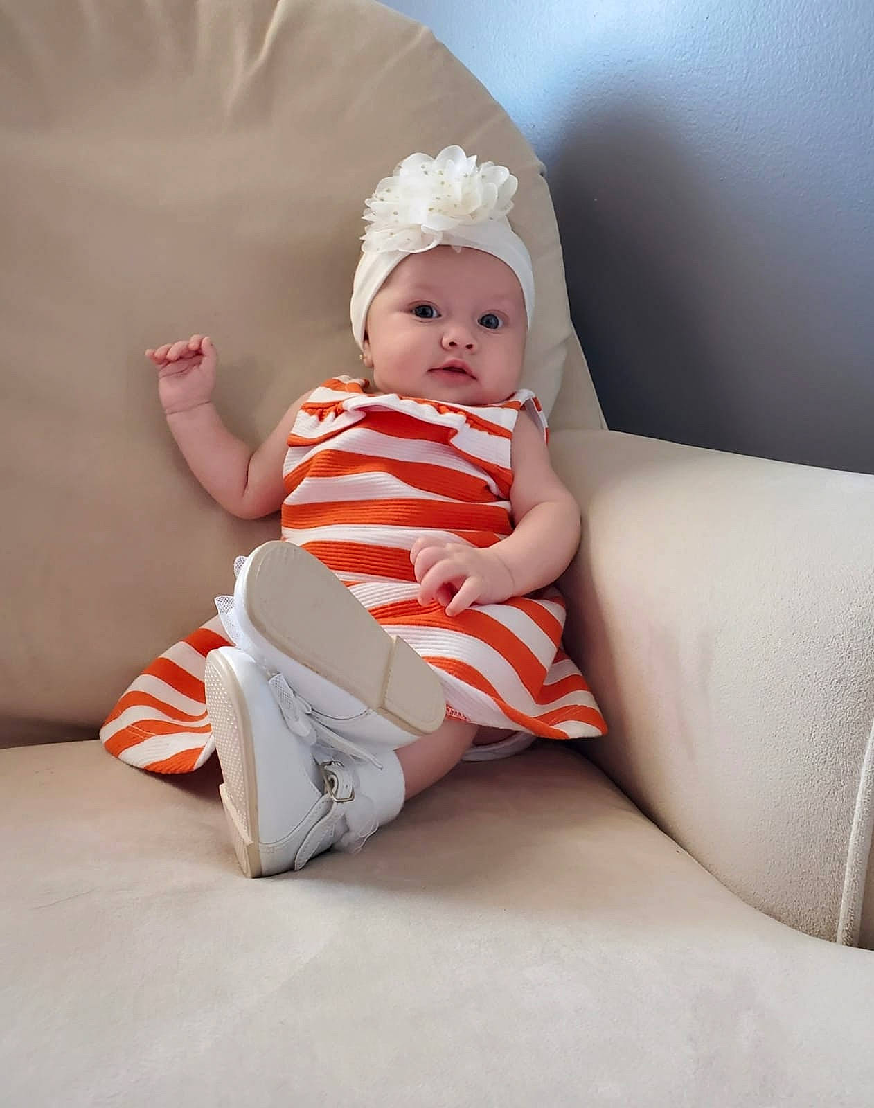 Sophie is registered to the contest to win money with this photo: baby, baby_sleeping, baby_toddler_clothing, comfort, elbow, flash_photography, flooring, foot, happy, headwear, human_body, human_leg, knee, leg, person, room, sitting, sleeve, sock, t_shirt