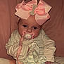 Ivy-Jayne joined the competition — help win amazing prizes! baby, bow, pacifier, pink, white_bow, striped_clothing, infant, face, cute, indoor, blanket, heart_shape, rhinestones, sitting, child, soft_toys, cozy, closeup, sleepwear, adorable